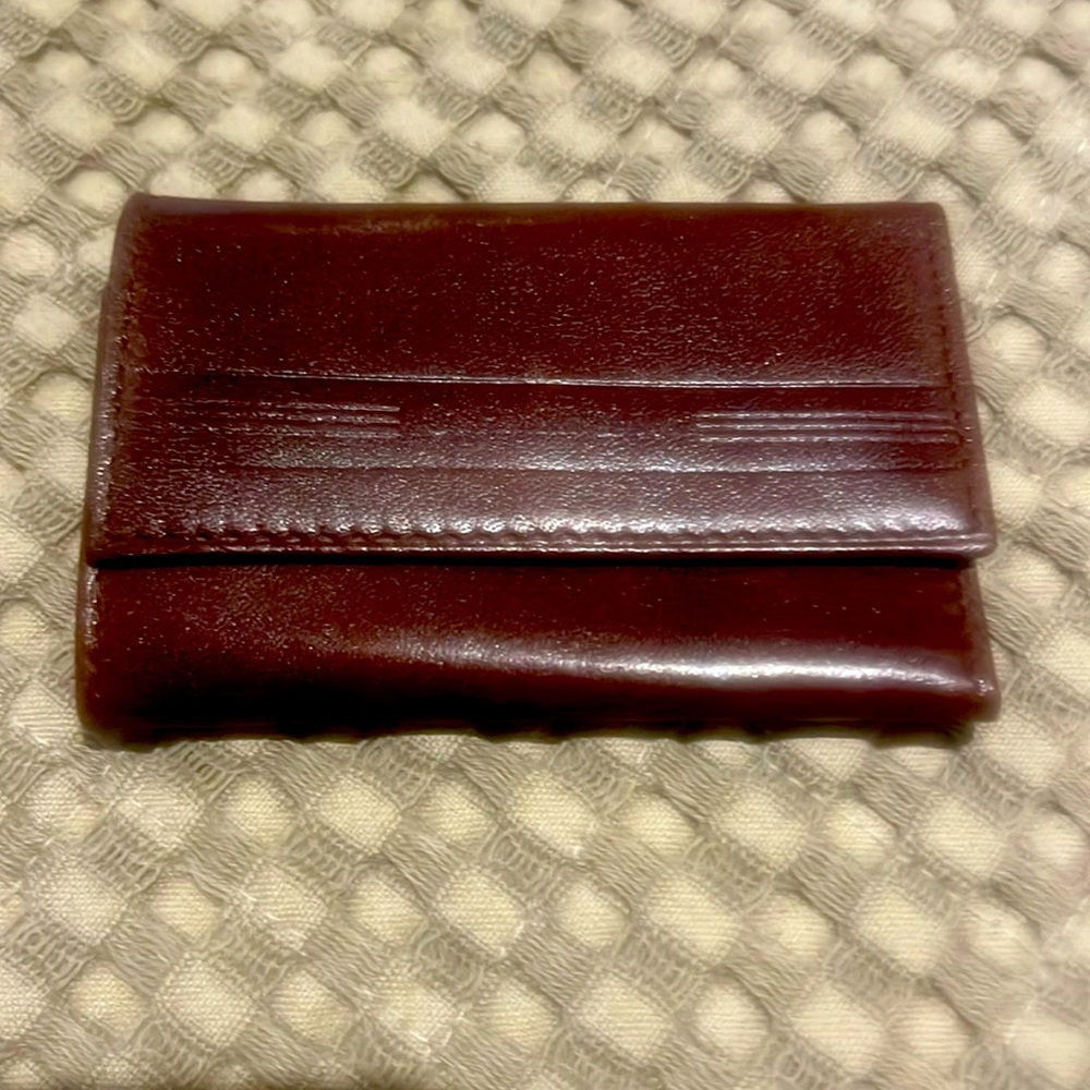 Christian Dior.  Like new. Key holder.